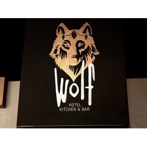 Wolf Hotel Kitchen & Bar logo