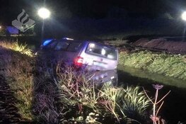 Taxibusje in sloot Sint Maartensvlotbrug