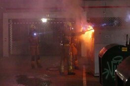 Kledingcontainer in brand