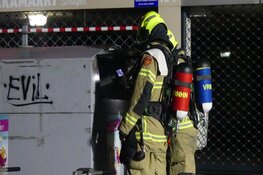 Kledingcontainer in brand