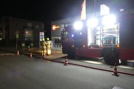 Kledingcontainer in brand