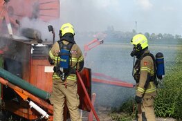Brand in landbouwmachine in Oudesluis