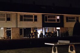Brand in woning, man vastgehouden door politie