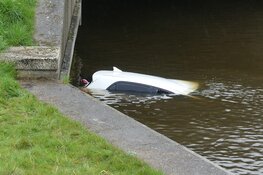 Auto te water in Schagerbrug
