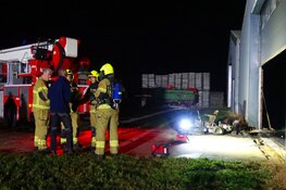 Brand in loods in 't Zand