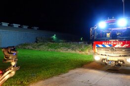 Brand in loods in 't Zand